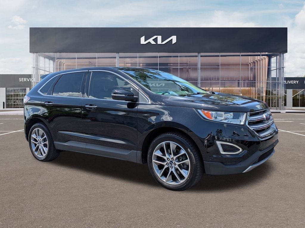 2016 Ford Edge Titanium in Shadow Black — front three-quarter view