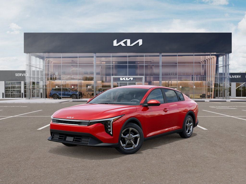 2026 Kia K4 LXS in Currant Red — front three-quarter view
