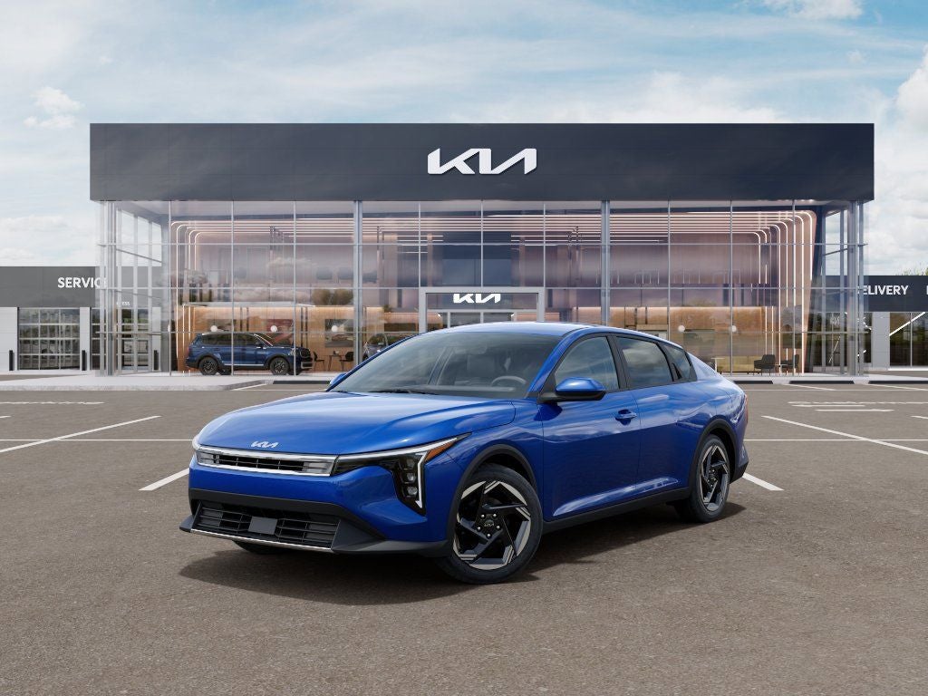2026 Kia K4 EX in Deep Sea Blue — front three-quarter view
