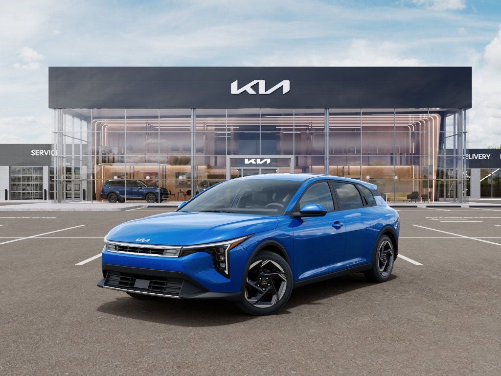 2026 Kia K4 EX in Wave Blue — front three-quarter view