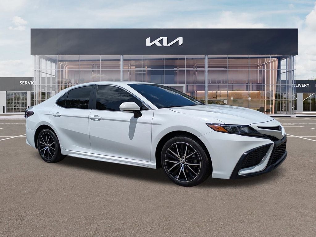 2024 Toyota Camry SE in Ice Cap — front three-quarter view
