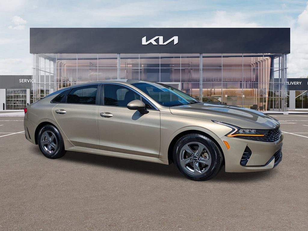 2022 Kia K5 LXS in Crystal Beige — front three-quarter view