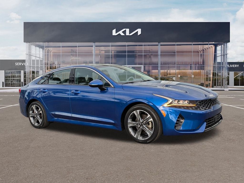 2023 Kia K5 EX in Sapphire Blue — front three-quarter view