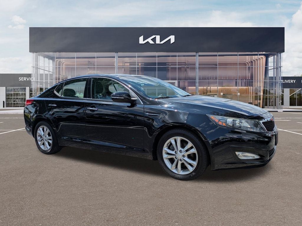 2012 Kia Optima EX in Ebony Black — front three-quarter view