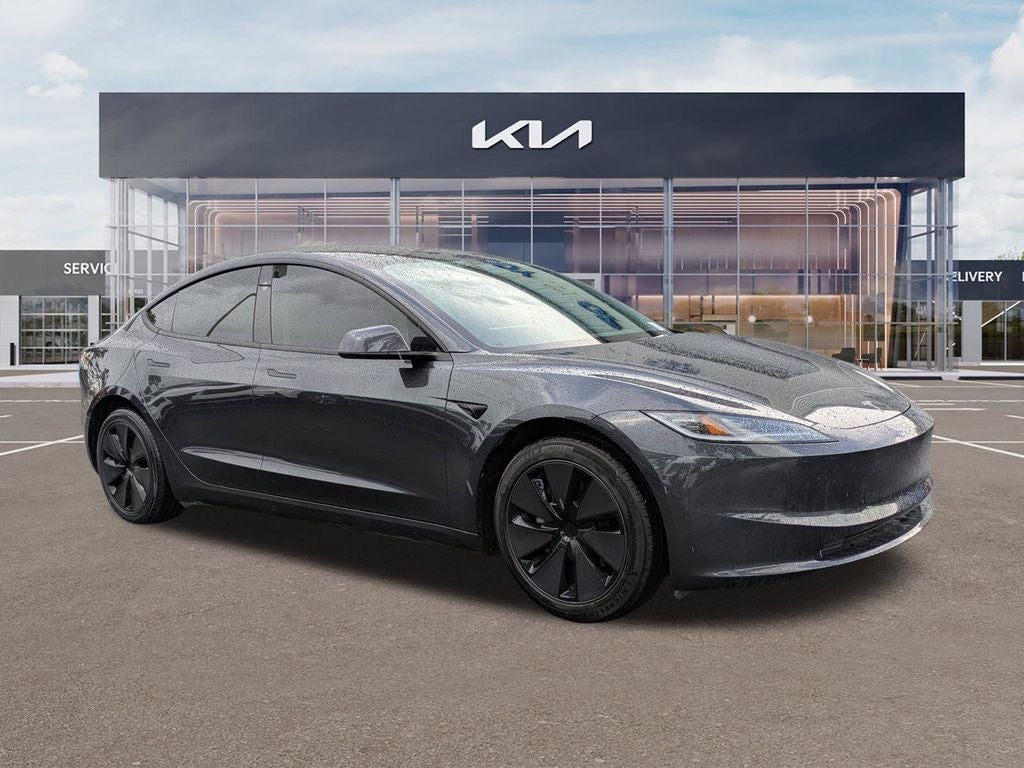 2025 Tesla Model 3 Standard in Gray — front three-quarter view
