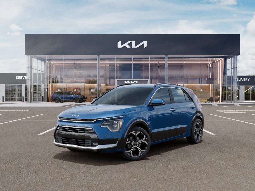 2026 Kia Niro SX Touring in Mineral Blue — front three-quarter view