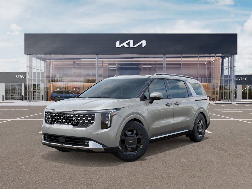 2026 Kia Carnival SX in Ivory Silver — front three-quarter view