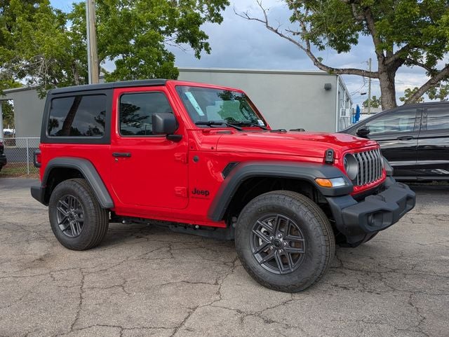2026 Jeep Wrangler WRANGLER 2-DOOR SPORT in Firecracker Red Clear-Coat Exterior Paint — front three-quarter view