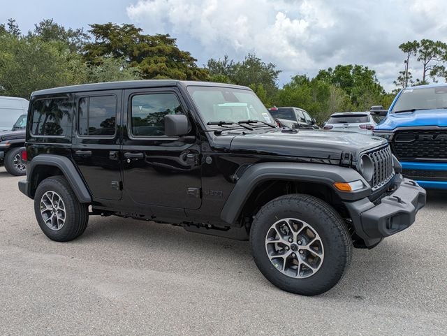 2026 Jeep Wrangler WRANGLER 4-DOOR SPORT S in Black Clear-Coat Exterior Paint — front three-quarter view
