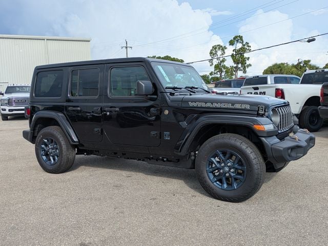 2026 Jeep Wrangler WRANGLER 4-DOOR 85TH ANNIVERSARY EDITION in Black Clear-Coat Exterior Paint — front three-quarter view