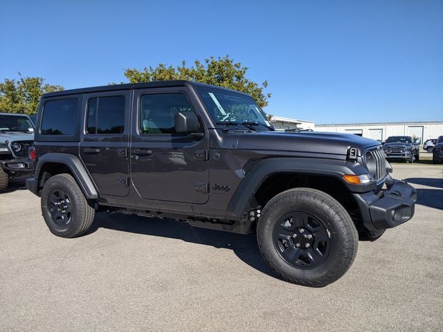 2026 Jeep Wrangler WRANGLER 4-DOOR SPORT in Granite Crystal Metallic Clear-Coat Exterior Paint — front three-quarter view