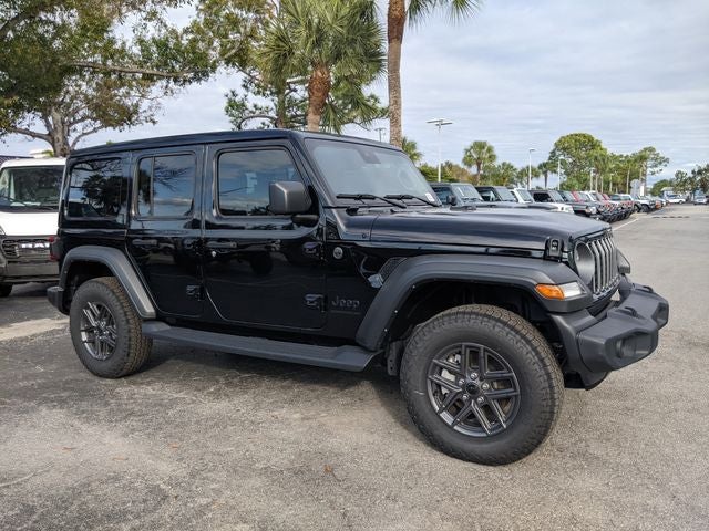 2025 Jeep Wrangler WRANGLER 4-DOOR SPORT S in Black Clear-Coat Exterior Paint — front three-quarter view