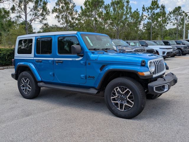 2026 Jeep Wrangler WRANGLER 4-DOOR SAHARA in Hydro Blue Pearl-Coat Exterior Paint — front three-quarter view