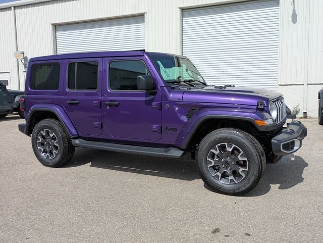2026 Jeep Wrangler WRANGLER 4-DOOR SAHARA in Reign Exterior Paint — front three-quarter view