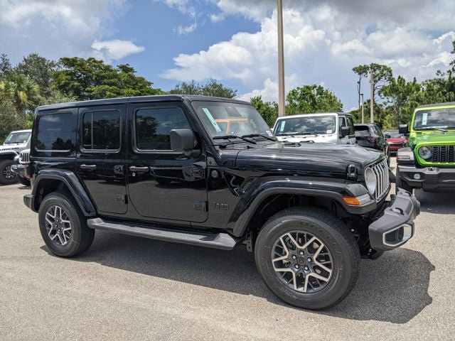 2025 Jeep Wrangler Sahara in Black Clearcoat — front three-quarter view