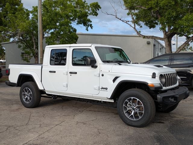 2026 Jeep Gladiator GLADIATOR SPORT S 4X4 in Bright White Clear-Coat Exterior Paint — front three-quarter view