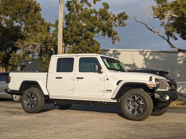 2026 Jeep Gladiator GLADIATOR SAHARA 4X4 in Bright White Clear-Coat Exterior Paint — front three-quarter view