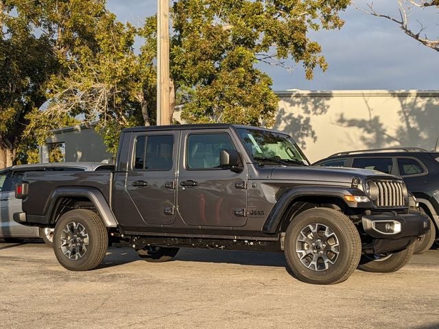 2026 Jeep Gladiator GLADIATOR SAHARA 4X4 in Granite Crystal Metallic Clear-Coat Exterior Paint — front three-quarter view