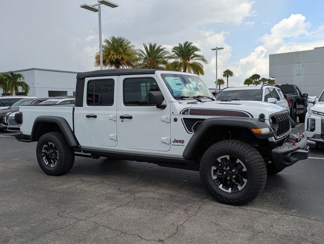 2026 Jeep Gladiator GLADIATOR SHADOW OPS 4X4 in Bright White Clear-Coat Exterior Paint — front three-quarter view