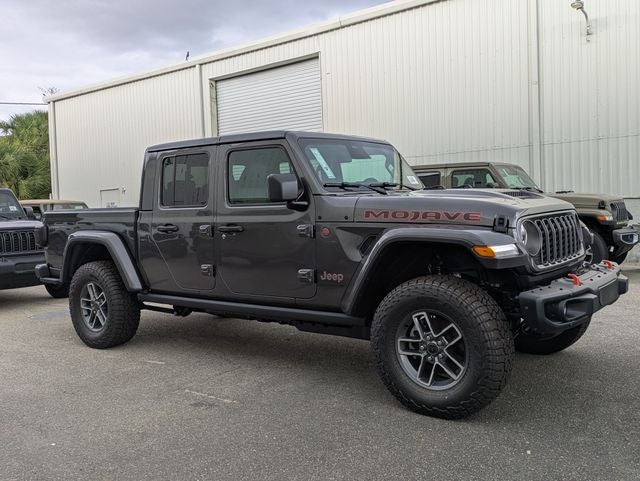 2026 Jeep Gladiator GLADIATOR MOJAVE 4X4 in Granite Crystal Metallic Clear-Coat Exterior Paint — front three-quarter view