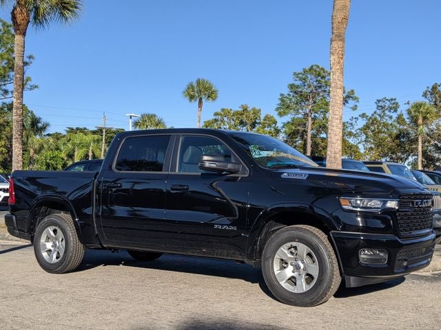 2026 RAM Ram 1500 RAM 1500 BIG HORN CREW CAB 4X4 5'7' BOX in Diamond Black Crystal Pearl-Coat Exterior Paint — front three-quarter view