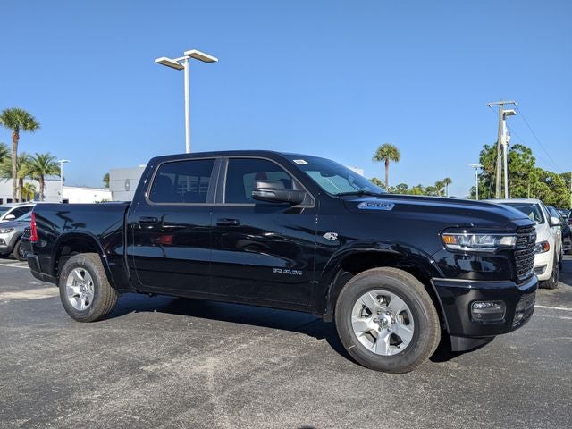 2026 RAM 1500 Big Horn/Lone Star in Diamond Black Crystal Pearlcoat — front three-quarter view
