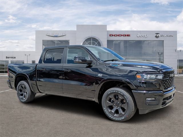 2026 RAM Ram 1500 RAM 1500 BIG HORN CREW CAB 4X4 5'7' BOX in Diamond Black Crystal Pearl-Coat Exterior Paint — front three-quarter view
