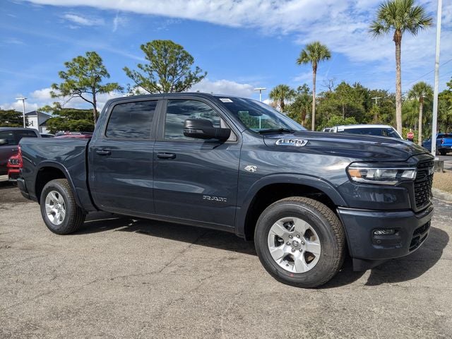 2026 RAM Ram 1500 RAM 1500 BIG HORN CREW CAB 4X4 5'7' BOX in Forged Blue Metallic Exterior Paint — front three-quarter view