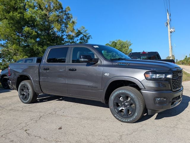 2026 RAM Ram 1500 RAM 1500 BIG HORN CREW CAB 4X4 5'7' BOX in Granite Crystal Metallic Clear-Coat Exterior Paint — front three-quarter view