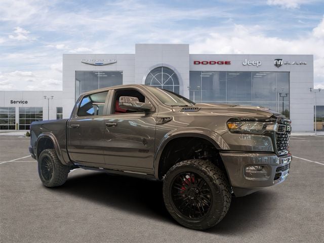 2026 RAM Ram 1500 RAM 1500 BIG HORN CREW CAB 4X4 5'7' BOX in Granite Crystal Metallic Clear-Coat Exterior Paint — front three-quarter view