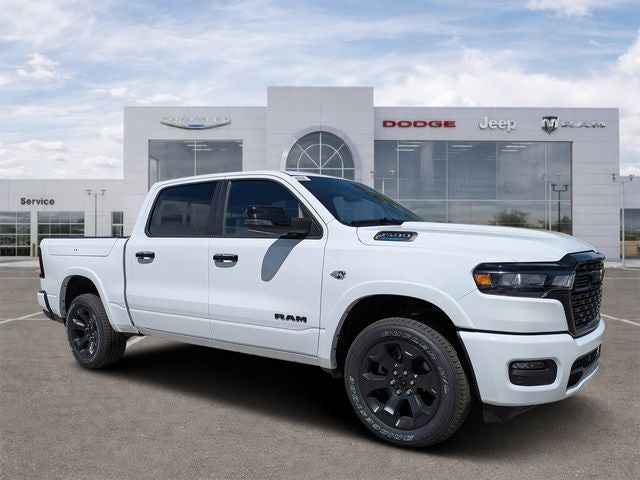 2026 RAM Ram 1500 RAM 1500 BIG HORN CREW CAB 4X4 5'7' BOX in Bright White Clear-Coat Exterior Paint — front three-quarter view