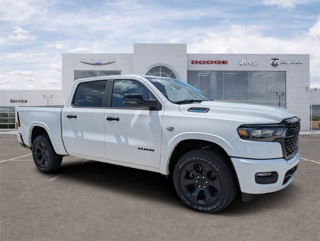 2026 RAM Ram 1500 RAM 1500 BIG HORN CREW CAB 4X4 5'7' BOX in Bright White Clear-Coat Exterior Paint — front three-quarter view