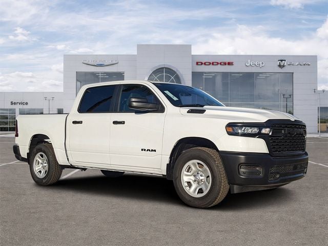 2026 RAM Ram 1500 RAM 1500 TRADESMAN CREW CAB 4X4 5'7' BOX in Bright White Clear-Coat Exterior Paint — front three-quarter view