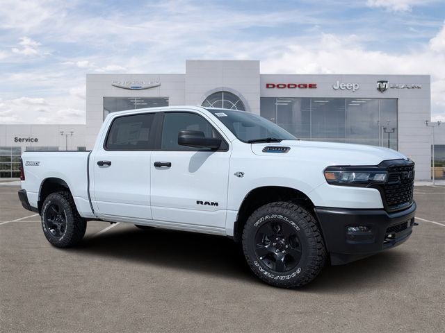 2026 RAM Ram 1500 RAM 1500 WARLOCK CREW CAB 4X4 5'7' BOX in Bright White Clear-Coat Exterior Paint — front three-quarter view