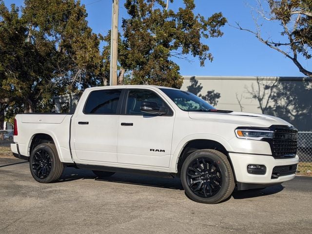 2026 RAM 1500 Limited in Ivory White Tri-Coat Pearlcoat — front three-quarter view