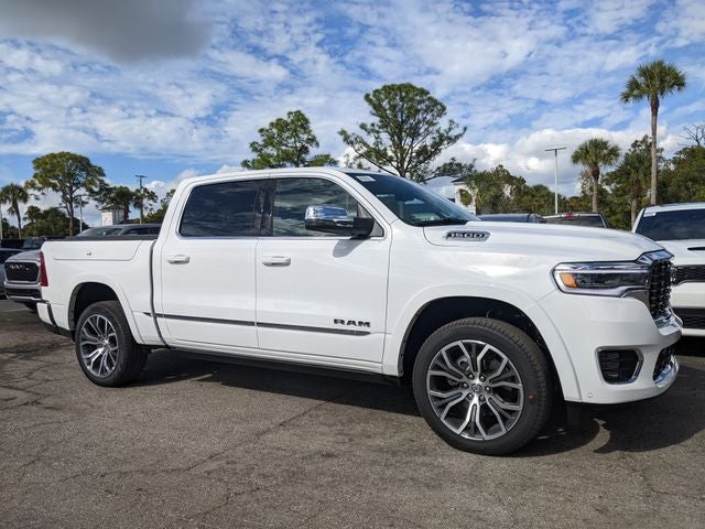 2026 RAM Ram 1500 RAM 1500 TUNGSTEN CREW CAB 4X4 in Bright White Clear-Coat Exterior Paint — front three-quarter view