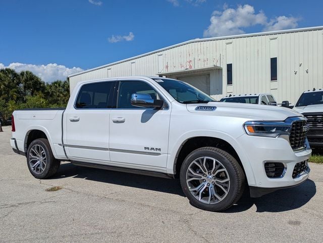 2026 RAM Ram 1500 RAM 1500 TUNGSTEN CREW CAB 4X4 in Ivory White Tri-Coat Pearl-Coat Exterior Paint — front three-quarter view