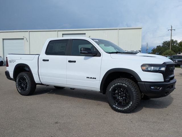 2026 RAM Ram 1500 RAM 1500 REBEL CREW CAB 4X4 5'7' BOX in Bright White Clear-Coat Exterior Paint — front three-quarter view