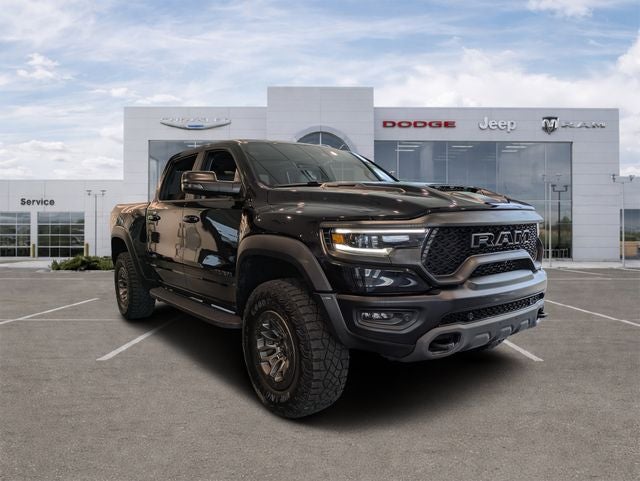 2024 RAM 1500 TRX Crew Cab 4x4 5'7' Box in Diamond Black Crystal Pearlcoat — front three-quarter view