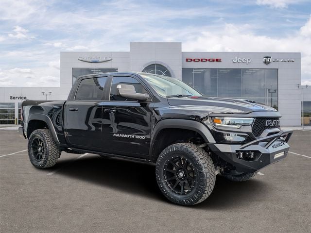2023 RAM 1500 TRX Crew Cab 4x4 5'7' Box in Diamond Black Crystal Pearlcoat — front three-quarter view
