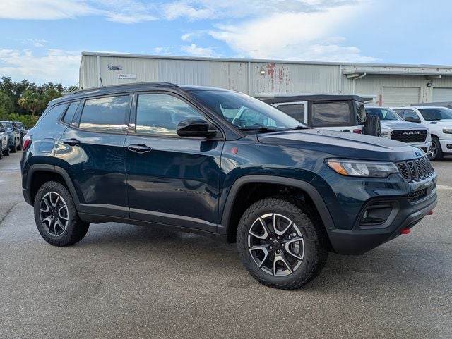 2026 Jeep Compass COMPASS TRAILHAWK 4X4 in Fathom Blue Pearl-Coat Exterior Paint — front three-quarter view