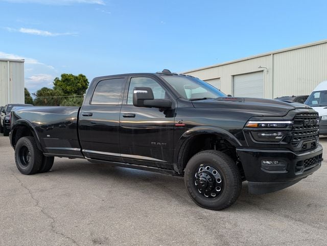 2026 RAM Ram 3500 RAM 3500 LIMITED CREW CAB 4X4 8' BOX in Diamond Black Crystal Pearl-Coat Exterior Paint — front three-quarter view