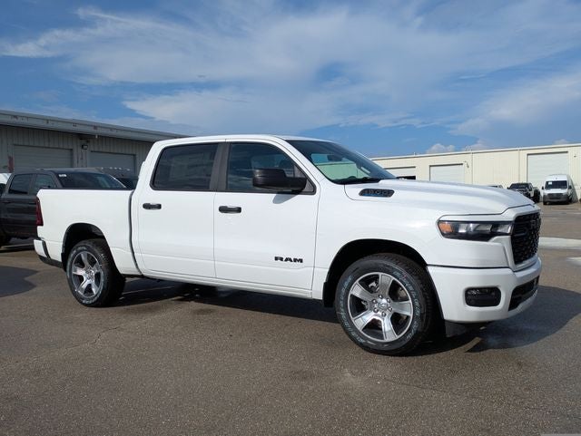 2026 RAM Ram 1500 RAM 1500 EXPRESS CREW CAB 4X2 5'7' BOX in Bright White Clear-Coat Exterior Paint — front three-quarter view