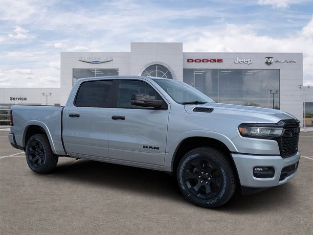 2026 RAM Ram 1500 RAM 1500 BIG HORN CREW CAB 4X4 5'7' BOX in Silver Zynith Exterior Paint — front three-quarter view