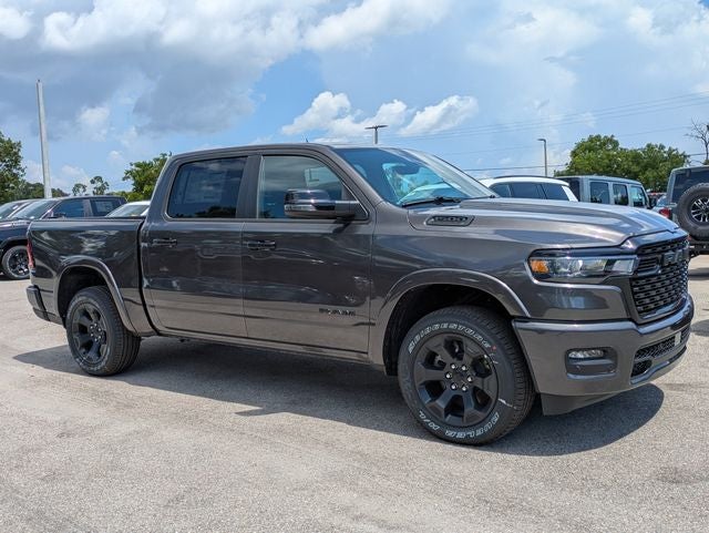 2026 RAM Ram 1500 RAM 1500 BIG HORN CREW CAB 4X4 5'7' BOX in Granite Crystal Metallic Clear-Coat Exterior Paint — front three-quarter view