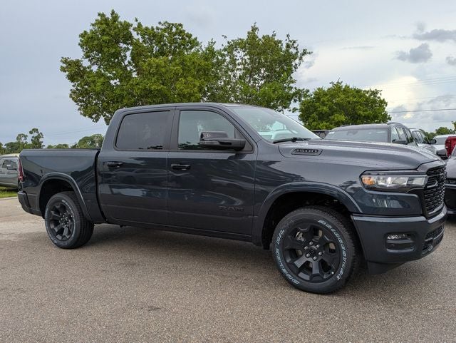 2026 RAM Ram 1500 RAM 1500 BIG HORN CREW CAB 4X4 5'7' BOX in Forged Blue Metallic Exterior Paint — front three-quarter view