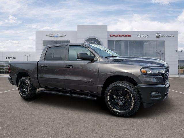 2026 RAM 1500 Warlock in Granite Crystal Metallic Clearcoat — front three-quarter view