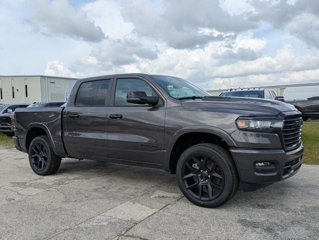 2026 RAM Ram 1500 RAM 1500 LARAMIE CREW CAB 4X4 5'7' BOX in Granite Crystal Metallic Clear-Coat Exterior Paint — front three-quarter view