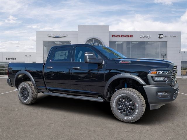 2026 RAM Ram 2500 RAM 2500 TRADESMAN CREW CAB 4X4 6'4' BOX in Diamond Black Crystal Pearl-Coat Exterior Paint — front three-quarter view
