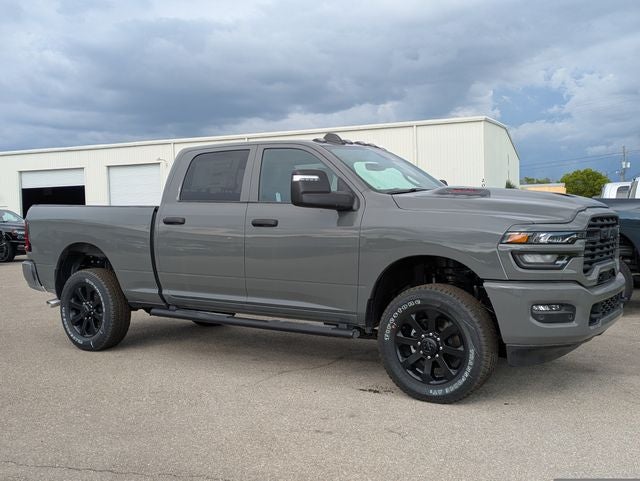 2026 RAM Ram 2500 RAM 2500 BLACK EXPRESS CREW CAB 4X4 6'4' BOX in Ceramic Gray Clear-Coat Exterior Paint — front three-quarter view